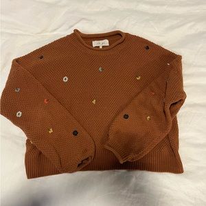 The Great Burnt Orange sweater with embroidered flowers